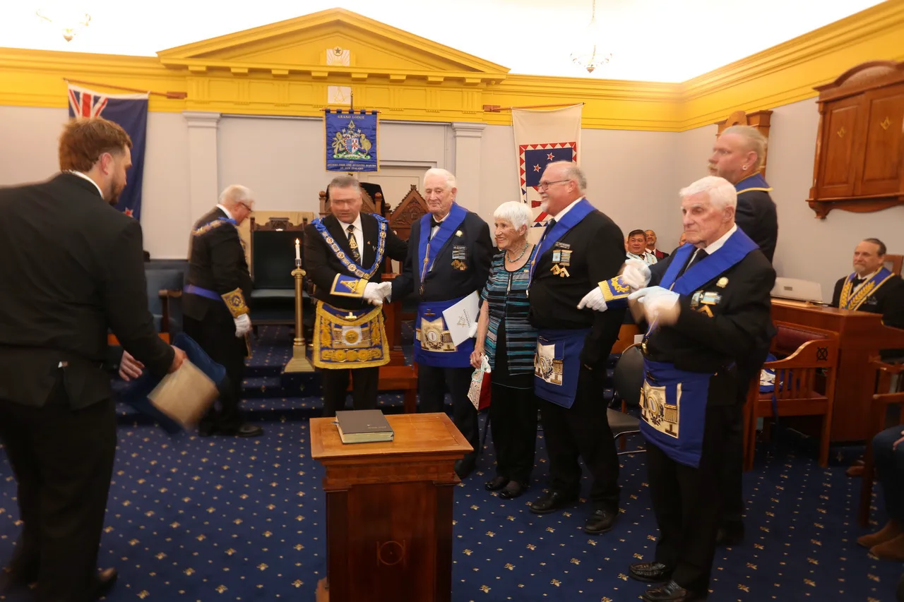 Brethren and guests gathered for a presentation during the meeting