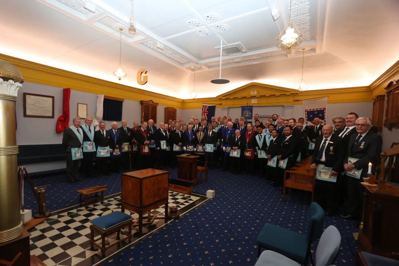 Brethren gathered in the lodge room after the meeting