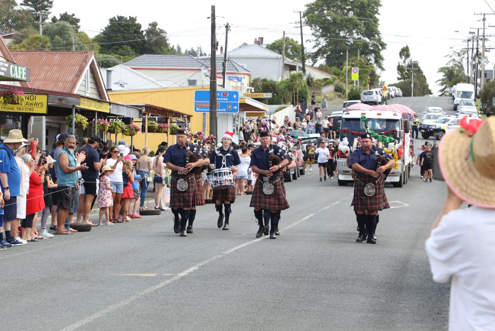A pipe band marching in the parade