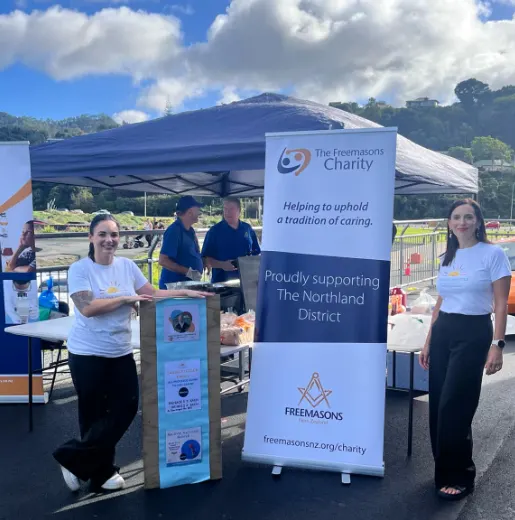 Members at the stall banners